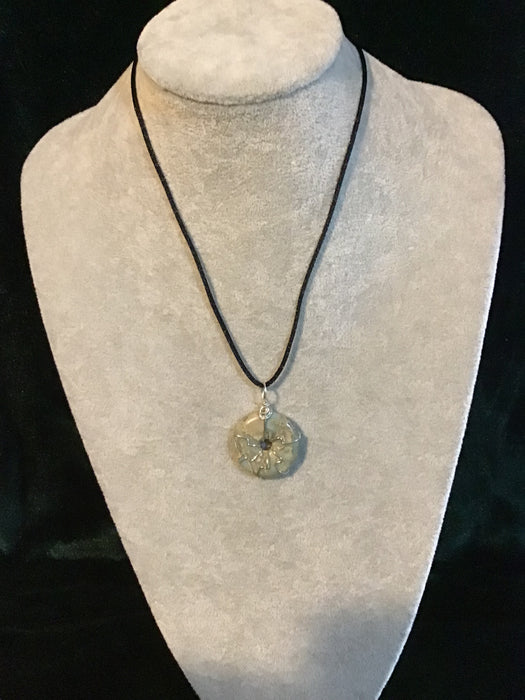Wire wrapped gemstone donut on18" black satin adjustable cord.