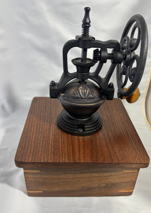 Walnut antique style coffee grinder.