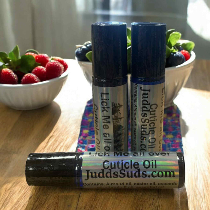 glass roller bottle containing nourishing oils to help hydrate your cuticles. Scented with lick me all over fragrance oil