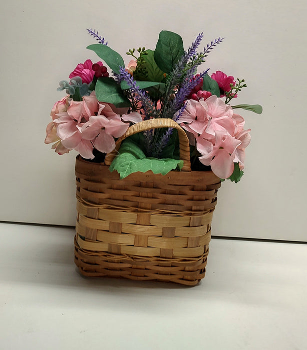 Spring basket door hanger