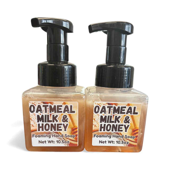 Two bottles of Oatmeal Milk & Honey foaming hand soap on a white background