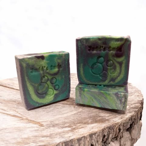 4oz bar of soap, colored purple, green and teal. Scented with patchouli fragrance oil.