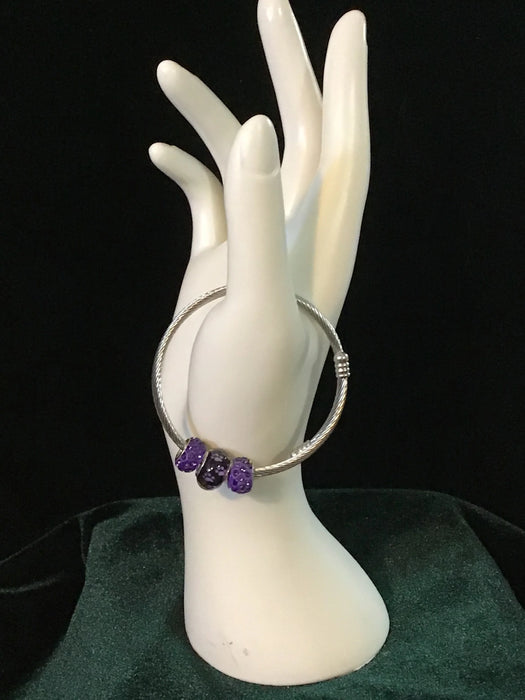 Silver snake bracelet with dog paws bead