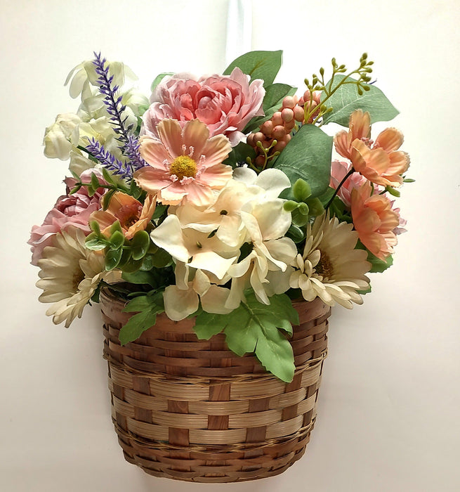 Spring basket door hanger