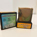 Bar of soap with packaging labeled 'Judds Suds' and 'Sun Baked Whiskey'.